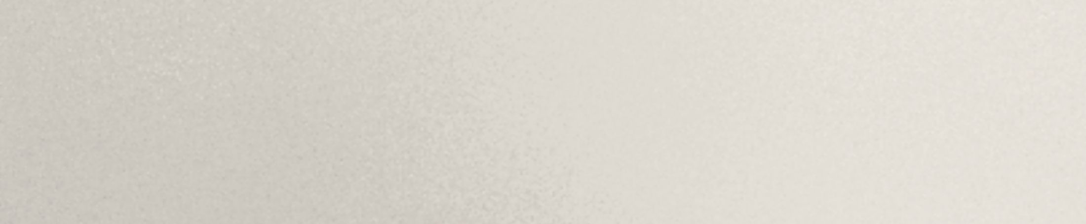 Textured light beige background with subtle shading.