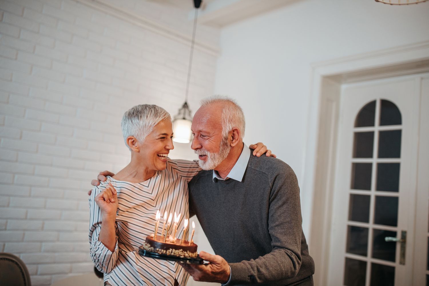 Alpharetta Laser Vaginal Rejuvenation models embracing joyfully in a warm moment.