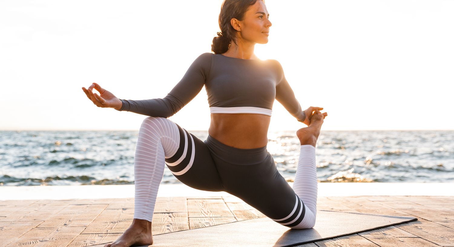 Alpharetta Hormone Treatment for Perimenopause model  with curly hair outdoors.